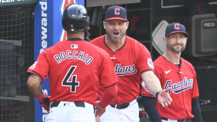 May 21, 2024; Cleveland, Ohio, USA; Cleveland Guardians manager Stephen Vogt (12) celebrates with shortstop Brayan Rocchio (4) in the third inning against the New York Mets at Progressive Field. Mandatory Credit: David Richard-Imagn Images