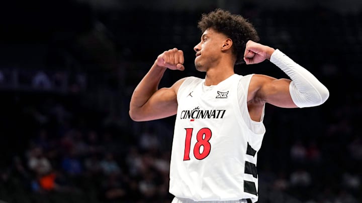 Cincinnati Bearcats forward Baba Miller (18) celebrates after completing a layup after being fouled in the first half of the Phillips 66 Big 12 Men’s Basketball Tournament between the Cincinnati Bearcats and Utah Utes, Tuesday, March 10, 2026, at T-Mobile Center in Kansas City, MO.