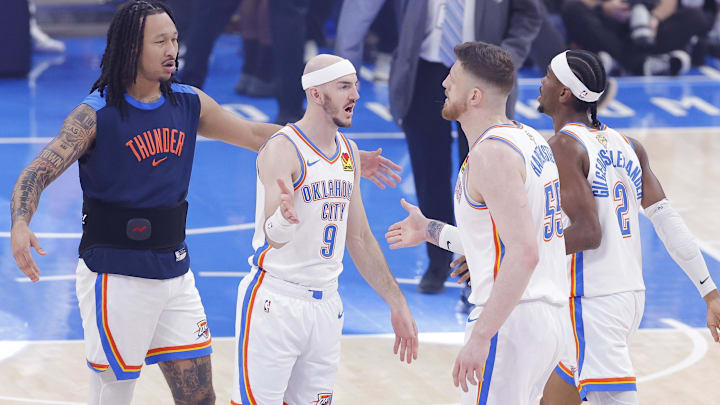 Jun 16, 2025; Oklahoma City, Oklahoma, USA; Oklahoma City Thunder guard Alex Caruso (9) and center Isaiah Hartenstein (55) and guard Shai Gilgeous-Alexander (2) celebrate in the first quarter against the Indiana Pacers during game five of the 2025 NBA Finals at Paycom Center. Mandatory Credit: Alonzo Adams-Imagn Images