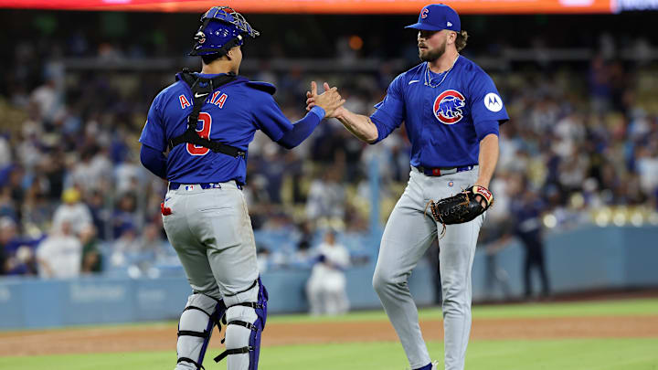 Sep 10, 2024; Los Angeles, California, USA; Chicago Cubs relief pitcher Porter Hodge (37) and catcher Miguel Amaya (9) celebrate a victory after defeating the Los Angeles Dodgers at Dodger Stadium. Sep 10, 2024; Los Angeles, California, USA; Chicago Cubs relief pitcher Porter Hodge (37) and catcher Miguel Amaya (9) celebrate a victory after defeating the Los Angeles Dodgers at Dodger Stadium.