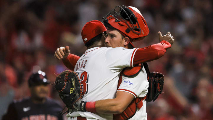 Jun 12, 2024; Cincinnati, Ohio, USA; Cincinnati Reds relief pitcher Alexis Diaz (43) hugs catcher Tyler Stephenson (37) after the victory over the Cleveland Guardians at Great American Ball Park. Mandatory Credit: Katie Stratman-USA TODAY Sports