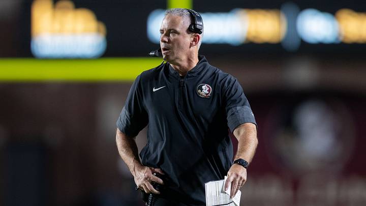 Florida State Seminoles head coach Mike Norvell talks into his headset during a timeout. The Florida State Seminoles defeated the New Mexico State Aggies 34-17 at Doak Campbell Stadium on Saturday, Aug. 29, 2026.