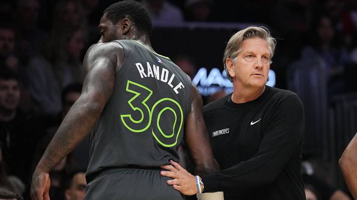 Mar 7, 2025; Miami, Florida, USA;  Minnesota Timberwolves head coach Chris Finch greets forward Julius Randle (30) as he goes to the bench during the first half against the Miami Heat at Kaseya Center. 