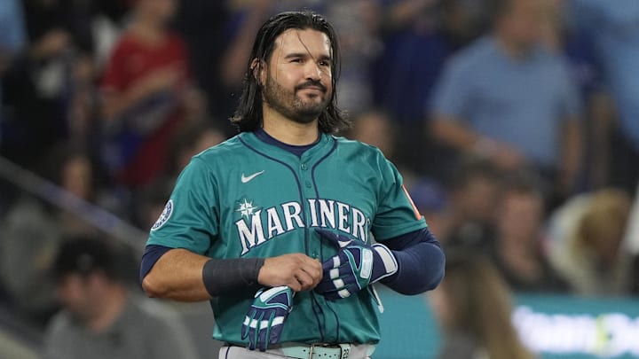 Oct 19, 2025; Toronto, Ontario, CAN; Seattle Mariners third baseman Eugenio Suarez (28) reacts after striking out against the Toronto Blue Jays in the second inning during game six of the ALCS round for the 2025 MLB playoffs at Rogers Centre. Mandatory Credit: John E. Sokolowski-Imagn Images