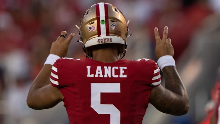 Aug 19, 2023; Santa Clara, California, USA;  San Francisco 49ers quarterback Trey Lance (5) signals during the third quarter against the Denver Broncos at Levi's Stadium. Mandatory Credit: Stan Szeto-Imagn Images