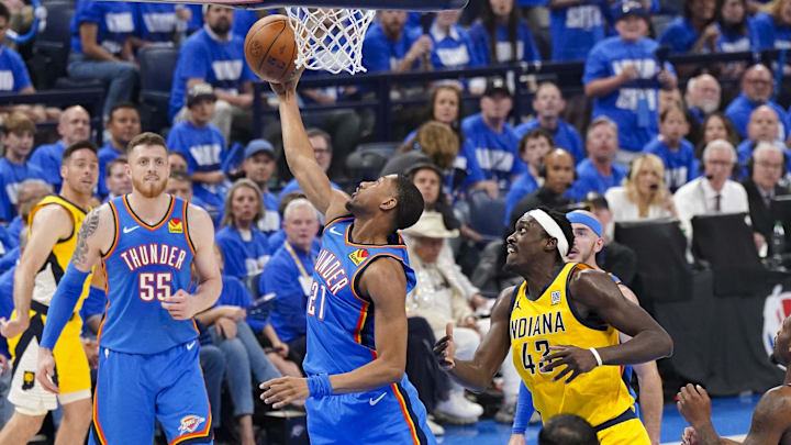 Jun 8, 2025; Oklahoma City, Oklahoma, USA; Oklahoma City Thunder guard Aaron Wiggins (21) drives to the basket past Indiana Pacers forward Pascal Siakam (43) during the second quarter in Game 2 of the 2025 NBA Finals at Paycom Center. Mandatory Credit: Kyle Terada-Imagn Images
