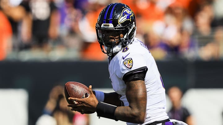 Oct 6, 2024; Cincinnati, Ohio, USA; Baltimore Ravens quarterback Lamar Jackson (8) runs with the ball against the Cincinnati Bengals in the first half at Paycor Stadium. Mandatory Credit: Katie Stratman-Imagn Images
