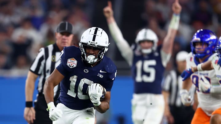 Penn State Nittany Lions running back Nicholas Singleton (10) rushes for a touchdown against the Boise State Broncos during the second half in the Fiesta Bowl at State Farm Stadium.