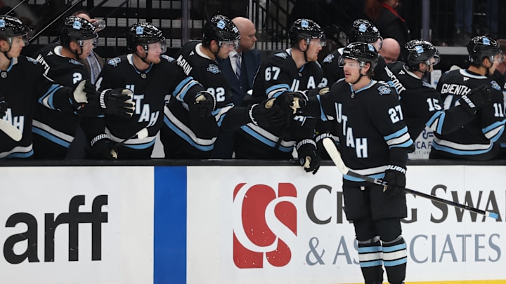 Oct 30, 2024; Salt Lake City, Utah, USA; Utah Hockey Club center Barrett Hayton (27) celebrates a goal against the Calgary Flames during the first period at Delta Center. Mandatory Credit: Rob Gray-Imagn Images