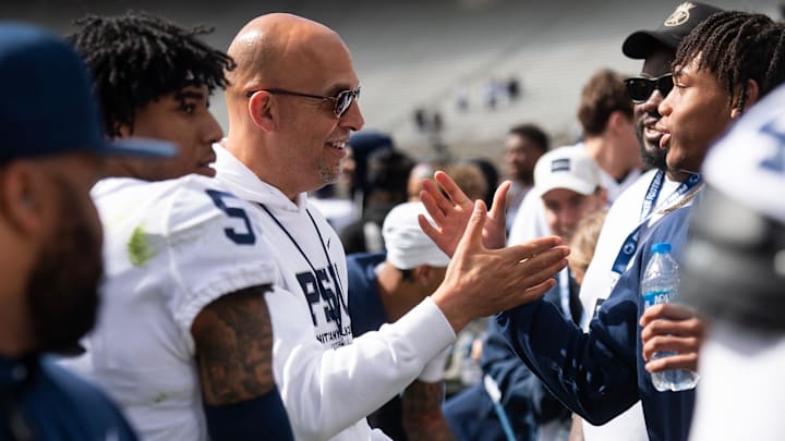 Penn State football head coach James Franklin greeting recruits and their families following the Blue-White game at Beaver Stadium