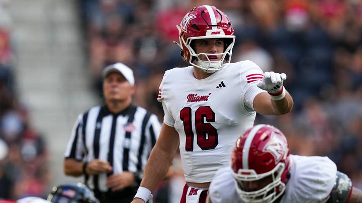 Sep 19, 2026; Cincinnati, Ohio, USA; Miami (OH) RedHawks quarterback David McComb (16) signals prior to a play at the line of scrimmage against the Cincinnati Bearcats in the first half at TQL Stadium. Mandatory Credit: Aaron Doster-Imagn Images Sep 19, 2026; Cincinnati, Ohio, USA; Miami (OH) RedHawks quarterback David McComb (16) signals prior to a play at the line of scrimmage against the Cincinnati Bearcats in the first half at TQL Stadium. Mandatory Credit: Aaron Doster-Imagn Images