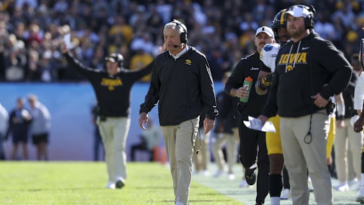 Dec 31, 2025; Tampa, FL, USA; Iowa Hawkeyes head coach Kirk Ferentz looks on during the ReliaQuest Bowl against the Vanderbilt Commodores at Raymond James Stadium. Mandatory Credit: Nathan Ray Seebeck-Imagn Images Dec 31, 2025; Tampa, FL, USA; Iowa Hawkeyes head coach Kirk Ferentz looks on during the ReliaQuest Bowl against the Vanderbilt Commodores at Raymond James Stadium. Mandatory Credit: Nathan Ray Seebeck-Imagn Images