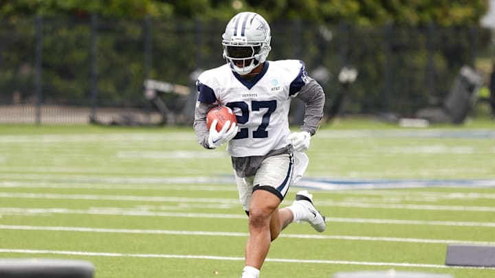 Dallas Cowboys running back Miles Sanders goes through a drill during practice at the Ford Center at the Star Training Facility in Frisco, Texas. 