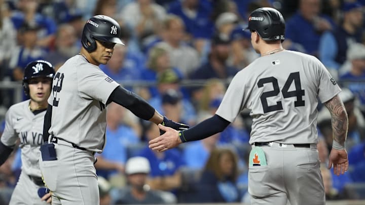 Oct 10, 2024; Kansas City, Missouri, USA; New York Yankees outfielder Juan Soto (22) congratulates outfielder Alex Verdugo (24) after scoring a run during the fifth inning against the Kansas City Royals during game four of the ALDS for the 2024 MLB Playoffs at Kauffman Stadium. Mandatory Credit: Jay Biggerstaff-Imagn Images