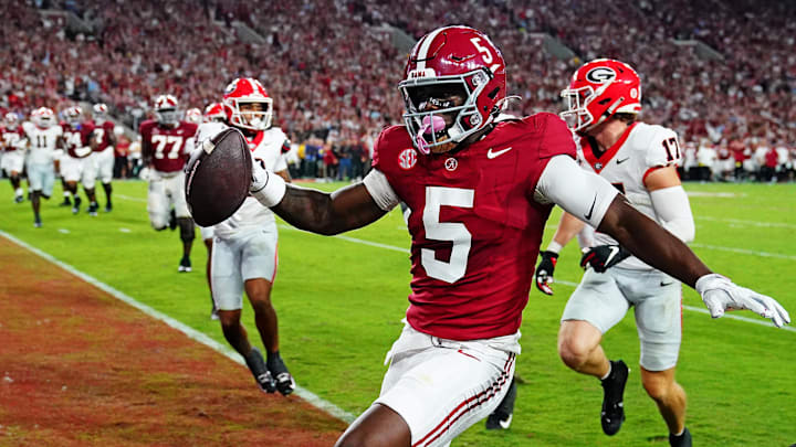 Sep 28, 2024; Tuscaloosa, Alabama, USA; Alabama Crimson Tide wide receiver Germie Bernard (5) score a touchdown during the first quarter against the Georgia Bulldogs at Bryant-Denny Stadium. Mandatory Credit: John David Mercer-Imagn Images