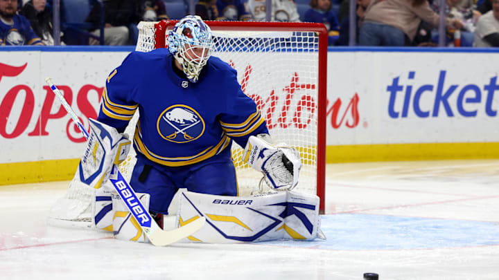Nov 9, 2024; Buffalo, New York, USA;  Buffalo Sabres goaltender Ukko-Pekka Luukkonen (1) looks to make a save during the first period against the Calgary Flames at KeyBank Center. Mandatory Credit: Timothy T. Ludwig-Imagn Images