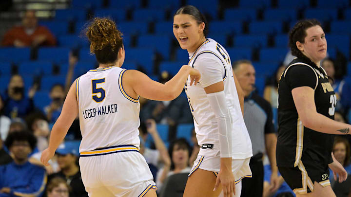 Jan 21, 2026; Los Angeles, California, USA; UCLA Bruins center Lauren Betts (51) congratulates guard Charlisse Leger-Walker (5) after a 3-point basket in the second half against the Purdue Boilermakers at Pauley Pavilion presented by Wescom Financial. Mandatory Credit: Jayne Kamin-Oncea-Imagn Images Jan 21, 2026; Los Angeles, California, USA; UCLA Bruins center Lauren Betts (51) congratulates guard Charlisse Leger-Walker (5) after a 3-point basket in the second half against the Purdue Boilermakers at Pauley Pavilion presented by Wescom Financial. Mandatory Credit: Jayne Kamin-Oncea-Imagn Images