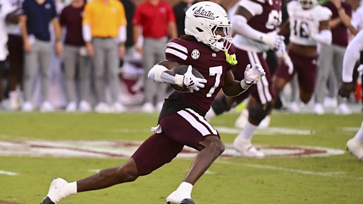 Oct 19, 2024; Starkville, Mississippi, USA; Mississippi State Bulldogs wide receiver Mario Craver (7) runs the ball against the Texas A&M Aggies before suffering an apparent injury on the play during the third quarter at Davis Wade Stadium at Scott Field. Mandatory Credit: Matt Bush-Imagn Images