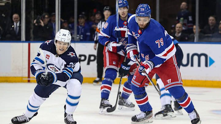 Mar 19, 2024; New York, New York, USA; New York Rangers defenseman K'Andre Miller (79) and Winnipeg