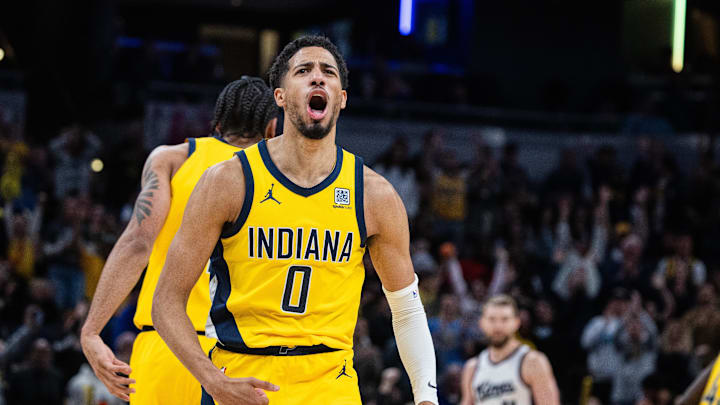 Mar 31, 2025; Indianapolis, Indiana, USA; Indiana Pacers guard Tyrese Haliburton (0) celebrates the game winning basket in the second half against the Sacramento Kings at Gainbridge Fieldhouse. Mandatory Credit: Trevor Ruszkowski-Imagn Images