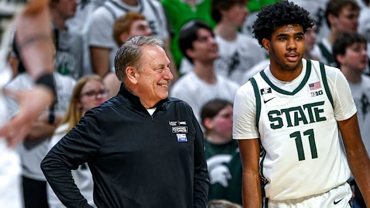 Michigan State's head coach Tom Izzo, left, smiles while talking with Jase Richardson during the game against Minnesota on Tuesday, Jan. 28, 2025, at the Breslin Center in East Lansing.