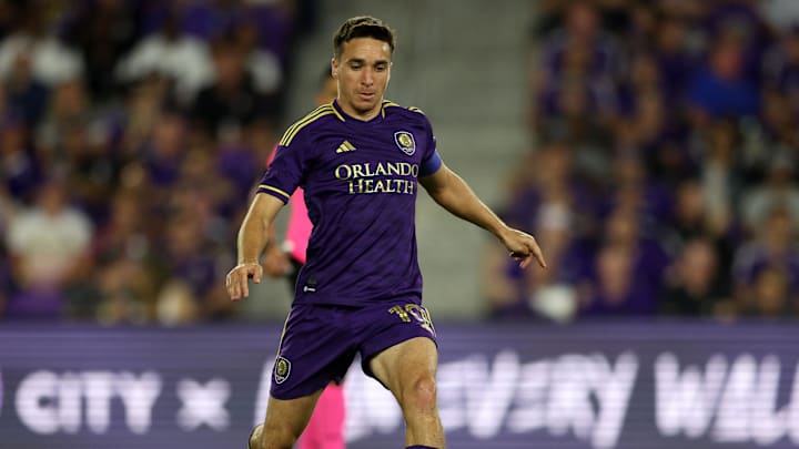 Feb 25, 2023; Orlando, Florida, USA; Orlando City SC midfielder Mauricio Pereyra (10) kicks the ball
