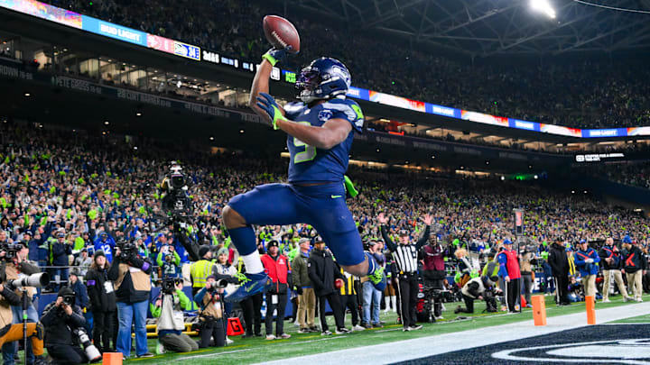 Jan 17, 2026; Seattle, WA, USA; Seattle Seahawks running back Kenneth Walker III (9) reacts after scoring a touchdown against the San Francisco 49ers during the second half in an NFC Divisional Round game at Lumen Field. Mandatory Credit: Steven Bisig-Imagn Images