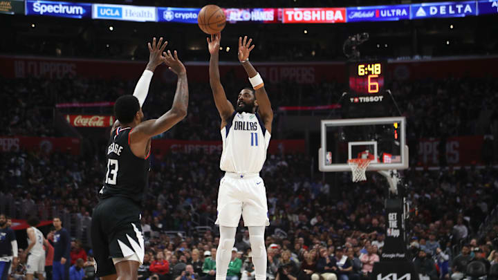 Apr 23, 2024; Los Angeles, California, USA; Dallas Mavericks guard Kyrie Irving (11) shoots the ball