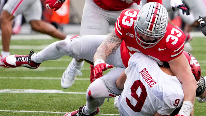 Ohio State Buckeyes defensive end Jack Sawyer (33) sacks Indiana Hoosiers quarterback Kurtis Rourke (9)