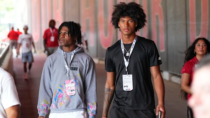 Aug 31, 2024; Columbus, OH, USA; Ohio State Buckeyes recruits Kayden Dixon-Wyatt and Chris Henry Jr. walk onto the field prior to the NCAA football game against the Akron Zips at Ohio Stadium. Ohio State won 52-6.