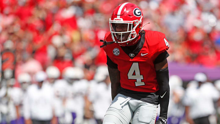 Georgia defensive back KJ Bolden (4) celebrates after sacking Tennessee Tech quarterback Jordyn Potts (5) during the first half of a NCAA college football game against Tennessee Tech in Athens, on Saturday, Sept. 7, 2024.