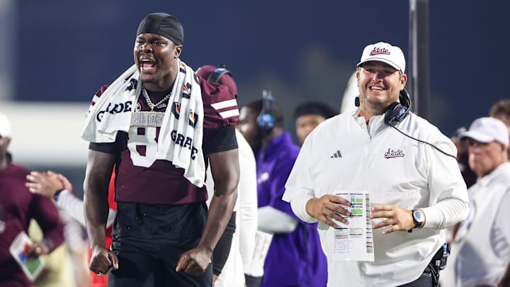 Mississippi State Bulldogs tight end Emeka Iloh (84) and head coach Jeff Lebby react during the second half against the Alcorn State Braves at Davis Wade Stadium at Scott Field.