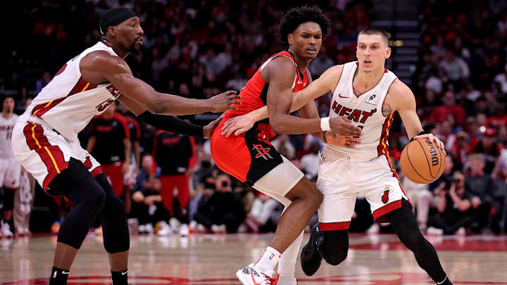 Dec 29, 2024; Houston, Texas, USA; Miami Heat guard Tyler Herro (14) handles the ball against Houston Rockets guard Amen Thompson (1) during the fourth quarter at Toyota Center. Mandatory Credit: Erik Williams-Imagn Images
Dec 29, 2024; Houston, Texas, USA; Miami Heat guard Tyler Herro (14) handles the ball against Houston Rockets guard Amen Thompson (1) during the fourth quarter at Toyota Center. Mandatory Credit: Erik Williams-Imagn Images