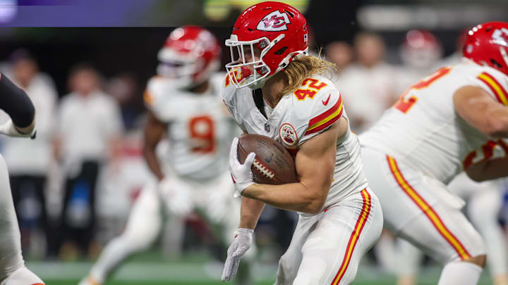 Sep 22, 2024; Atlanta, Georgia, USA; Kansas City Chiefs running back Carson Steele (42) runs the ball against the Atlanta Falcons in the first quarter at Mercedes-Benz Stadium. Mandatory Credit: Brett Davis-Imagn Images