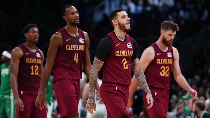 Oct 29, 2025; Boston, Massachusetts, USA; Cleveland Cavaliers guard Lonzo Ball (2), center Evan Mobley (4), forward/center Dean Wade (32) and forward/guard De'Andre Hunter (12) head back to the bench during a timeout against the Boston Celtics in the second half at TD Garden. Mandatory Credit: David Butler II-Imagn Images Oct 29, 2025; Boston, Massachusetts, USA; Cleveland Cavaliers guard Lonzo Ball (2), center Evan Mobley (4), forward/center Dean Wade (32) and forward/guard De'Andre Hunter (12) head back to the bench during a timeout against the Boston Celtics in the second half at TD Garden. Mandatory Credit: David Butler II-Imagn Images