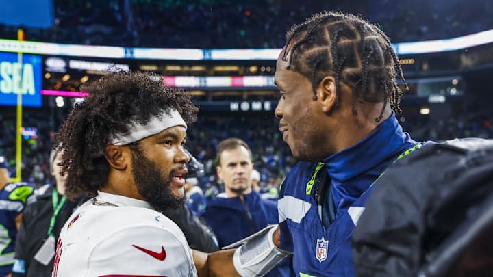 Nov 24, 2024; Seattle, Washington, USA; Arizona Cardinals quarterback Kyler Murray (1) shakes hands with Seattle Seahawks quarterback Geno Smith (7) following a Seahawks at Lumen Field. Mandatory Credit: Joe Nicholson-Imagn Images