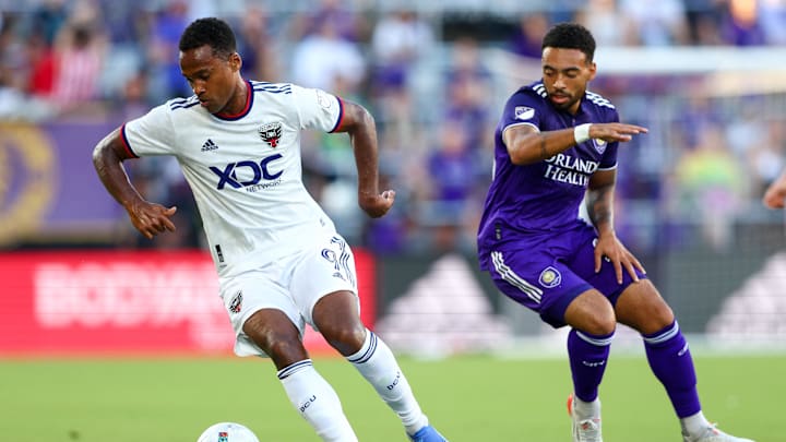 Jul 4, 2022; Orlando, Florida, USA; D.C. United forward Ola Kamara (9) moves the ball past Orlando