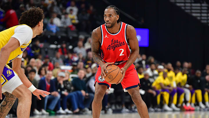 Feb 4, 2025; Inglewood, California, USA; Los Angeles Clippers forward Kawhi Leonard (2) controls the ball against the Los Angeles Lakers during the first half at Intuit Dome. Mandatory Credit: Gary A. Vasquez-Imagn Images