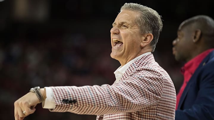 Feb 12, 2025; Fayetteville, Arkansas, USA;  Arkansas Razorbacks head coach John Calipari yells to his players on the court during the second half against the LSU Tigers at Bud Walton Arena. Arkansas won 70-58. Mandatory Credit: Brett Rojo-Imagn Images