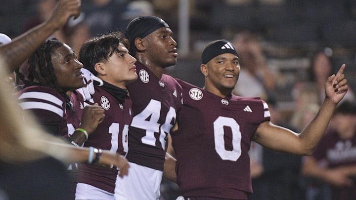 Nov 2, 2024; Starkville, Mississippi, USA; Mississippi State Bulldogs quarterback Michael Van Buren Jr. (0) celebrates with teammates after a game against the Massachusetts Minutemen at Davis Wade Stadium at Scott Field. Mandatory Credit: Matt Bush-Imagn Images