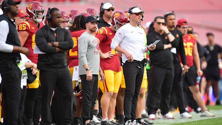 Nov 30, 2024; Los Angeles, California, USA; Southern California Trojans head coach Lincoln Riley watches game action against the Notre Dame Fighting Irish during the first half at the Los Angeles Memorial Coliseum. Mandatory Credit: Gary A. Vasquez-Imagn Images