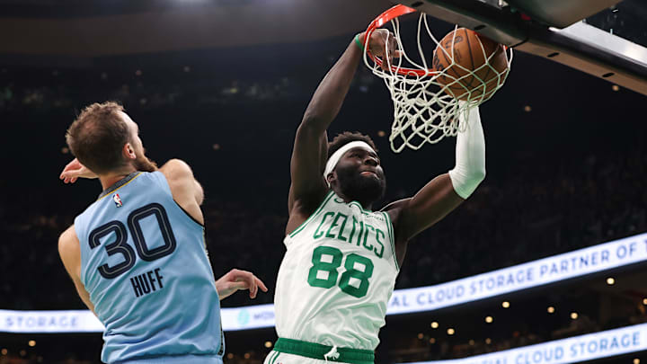 Dec 7, 2024; Boston, Massachusetts, USA; Boston Celtics center Neemias Queta (88) dunks the ball during the first half against the Memphis Grizzlies at TD Garden. Mandatory Credit: Paul Rutherford-Imagn Images