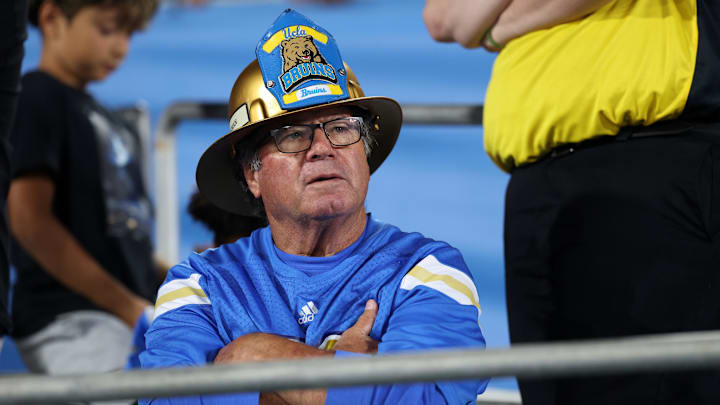 Sep 12, 2025; Pasadena, California, USA;  An UCLA Bruins fan looks on during the second half against the New Mexico Lobos at Rose Bowl. Mandatory Credit: Kiyoshi Mio-Imagn Images