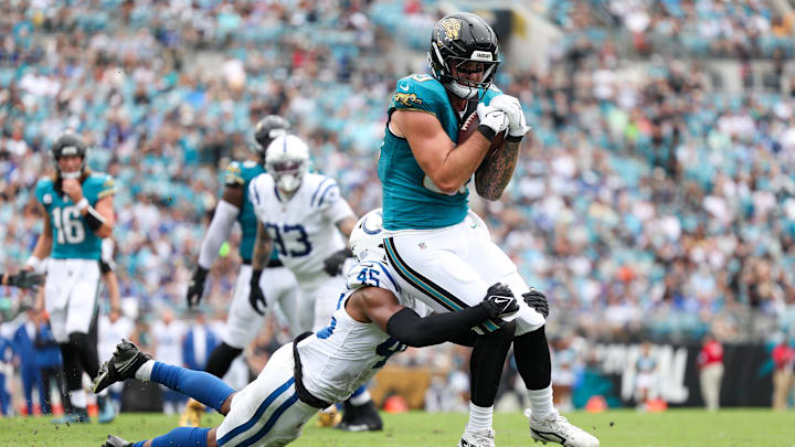Oct 6, 2024; Jacksonville, Florida, USA; Indianapolis Colts linebacker E.J. Speed (45) tackles Jacksonville Jaguars tight end Luke Farrell (89) short if the end zone in the second quarter at EverBank Stadium. Mandatory Credit: Nathan Ray Seebeck-Imagn Images