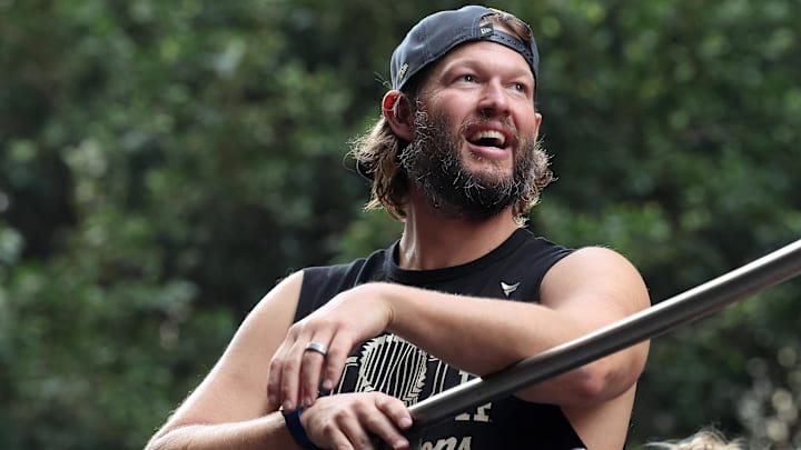 Los Angeles Dodgers pitcher Clayton Kershaw acknowledges the crowd during the World Series championship parade at downtown Los Angeles.