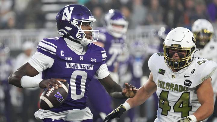 Sep 19, 2026; Evanston, Illinois, USA;  Northwestern Wildcats quarterback Aidan Chiles (0) is rushed by Colorado Buffaloes linebacker Gideon Lampron (44) during the first half at Northwestern Medicine Field at Martin Stadium.  Mandatory Credit: David Banks-Imagn Images