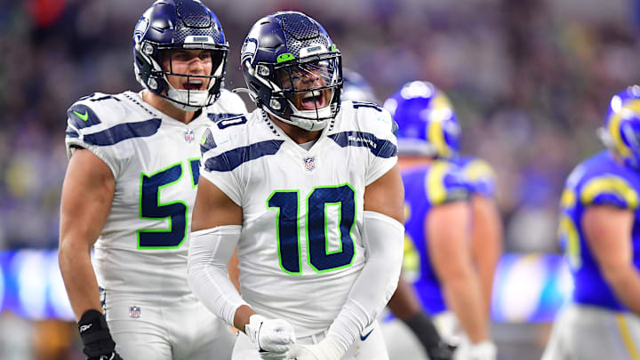 Dec 4, 2022; Inglewood, California, USA; Seattle Seahawks linebacker Uchenna Nwosu (10) and linebacker Cody Barton (57) react against the Los Angeles Rams during the second half at SoFi Stadium. Mandatory Credit: Gary A. Vasquez-Imagn Images