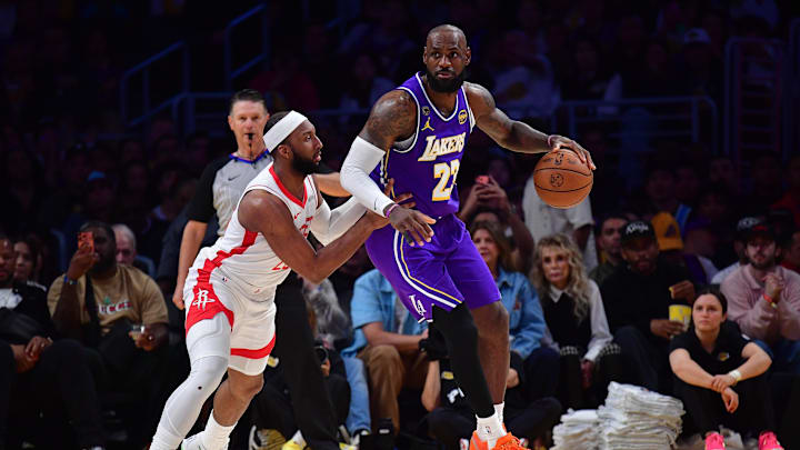Apr 29, 2026; Los Angeles, California, USA; Los Angeles Lakers forward LeBron James (23) moves the ball against Houston Rockets guard Josh Okogie (20) during the second half in game five of the first round of the 2026 NBA Playoffs at Crypto.com Arena. Mandatory Credit: Gary A. Vasquez-Imagn Images