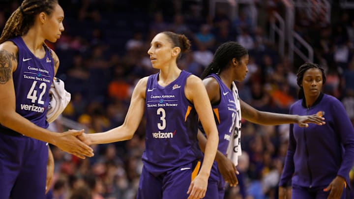 Mercury's Brittany Griner (42) high-fives Diana Taurasi (3) as they head to the locker room at Talking Stick Resort Arena in Phoenix, Ariz. on Aug. 19, 2018. 

865709002