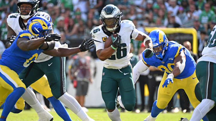 Sep 21, 2025; Philadelphia, Pennsylvania, USA; Philadelphia Eagles running back Saquon Barkley (26) runs with the ball against the Los Angeles Rams at Lincoln Financial Field. Mandatory Credit: Eric Hartline-Imagn Images